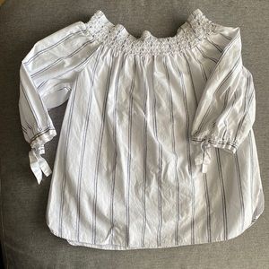 Off the shoulder white top with 1/2 length sleeves